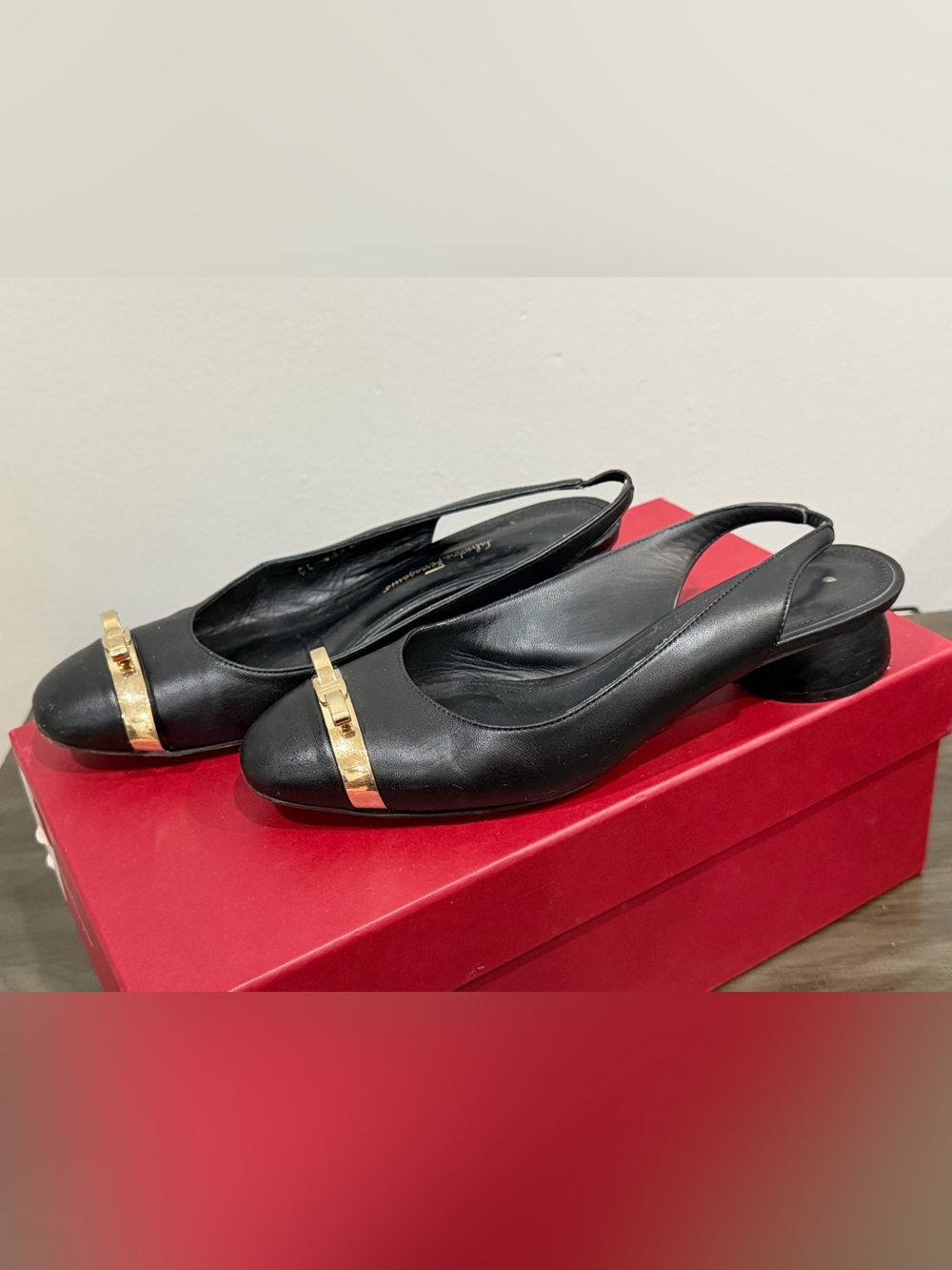 Salvatore Ferragamo Black Leather Slingback Flats with Gold Trim